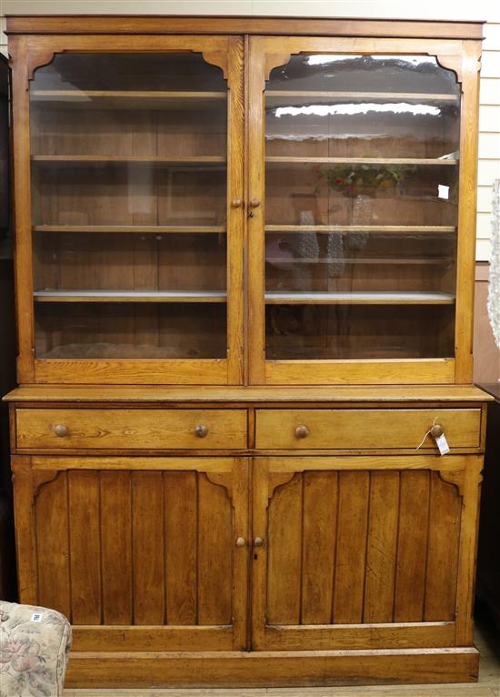 A Victorian ash bookcase / cupboard W.156cm